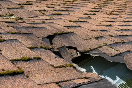broken asphalt roof